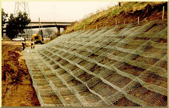 Placing gabions on dry banks