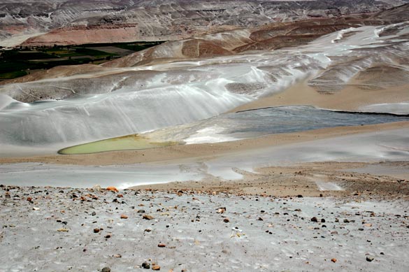 Lagoon formed in midslope elevation due to concentrated seepage, La Cano