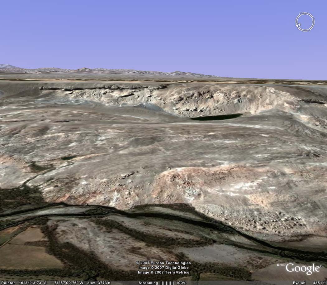 Side view of La Cano slide zone, showing river on bottom, lagoon on center top, and irrigated pampas on top